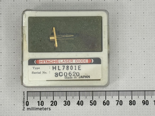 Hitachi HL7801E laser diode in original labeled case with serial 8C0620 above PartsMine millimeter ruler