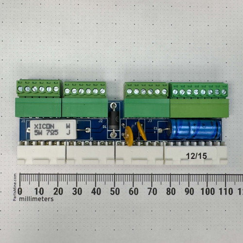 A BAPI HVAC PLCON Module BA/PLCON2 for Carrier PremierLink Controller from PartsMine.com, showing the top view of the module with green terminal blocks and blue components, placed on a millimeter grid.