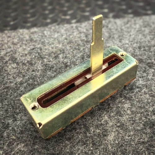 Alps 77480-314 slide potentiometer, perspective view showing metal body and lever.