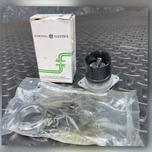 GE CR2940UB200B selector switch, mounting plate, original box, and hardware bag on floor plate