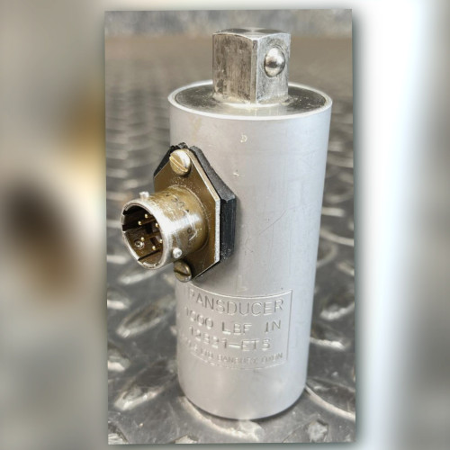Norbar torque transducer upright showing engraved label, six-pin connector and male square drive