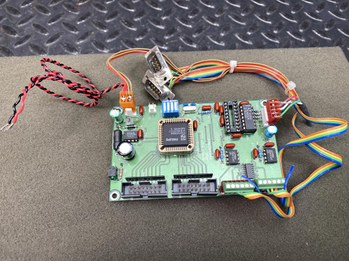 Simple Step SSQE SSQEXAO1PA-E stepper control board, top view with attached ribbon and power harness