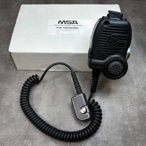 MSA 10030980 ClearCommand lapel microphone with coiled cable beside its labeled white MSA box