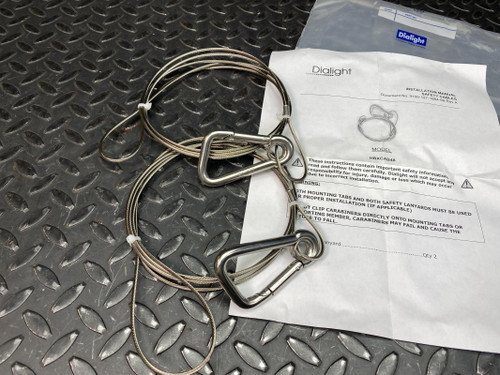 Dialight HBXCAB48 two coiled stainless safety cables with carabiners beside installation sheet and Dialight bag