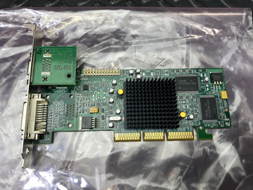 Matrox G550 F7012-03 front view with black passive heatsink, VGA daughterboard and gold AGP fingers