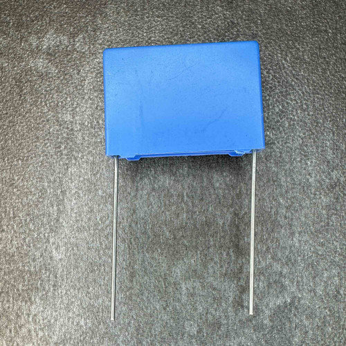 Pilkor WK9609 film capacitor showing blue rectangular body and radial wire leads.