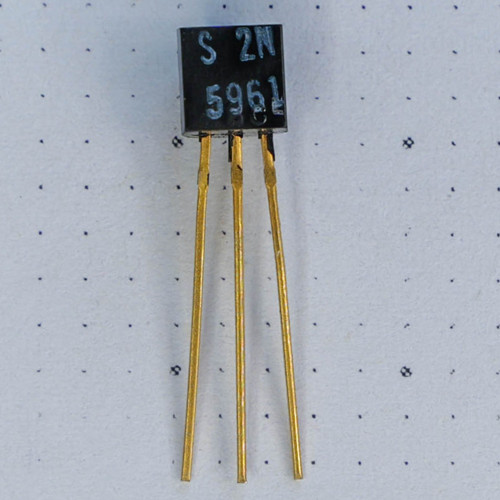 Front face of 2N5961 transistor marked S 2N 5961, three straight gold leads, millimeter ruler