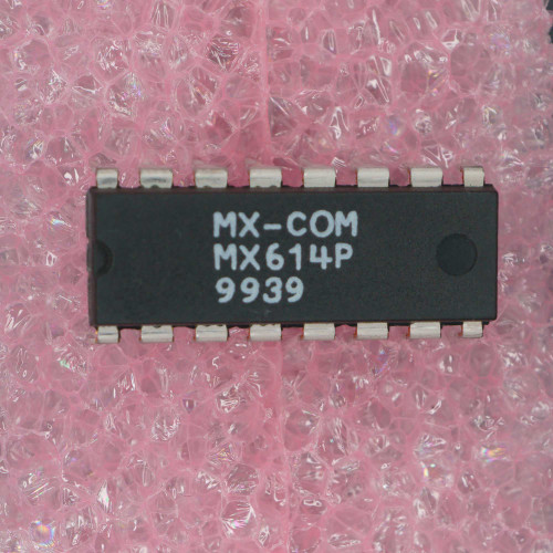 MX-COM MX614P 9939 date code. 16-pin DIP IC showing clean, unsoldered leads and no visible damage.