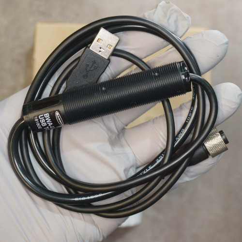 USB-A male end and knurled 5-pin M12 female connector visible; barrel label reads BWA-USB1WIRE; cable jacket marked STYLE 251, AWG, 105C, 300V.