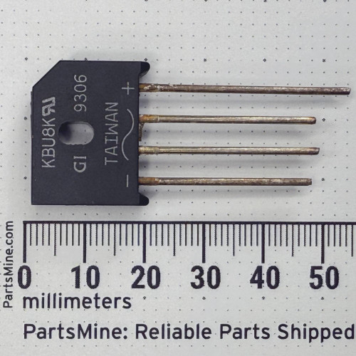 Black flat-pack body marked KBU8K, GI, TAIWAN, and date code 9306. Four leads show light oxidation along their length.