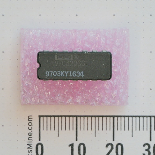 Burr-Brown VFC320CG integrated circuit in a 14-pin DIP package on pink foam.