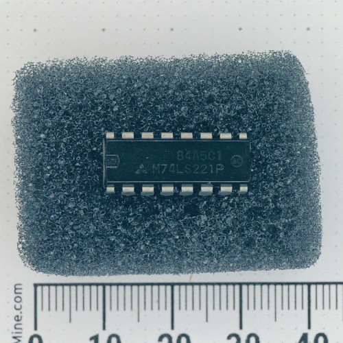 Top view of Mitsubishi M74LS221P 16-pin DIP integrated circuit in conductive foam.
