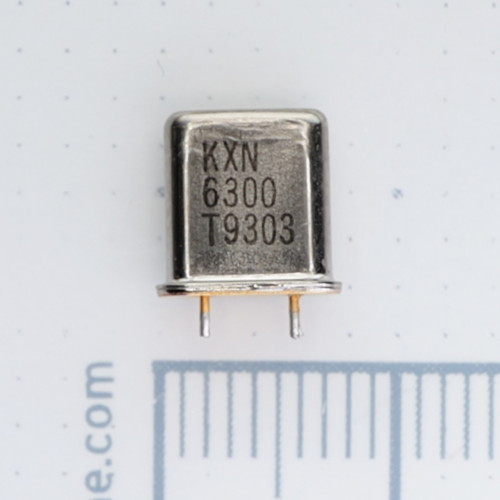 Front face of crystal package marked KXN 6300 T9303.