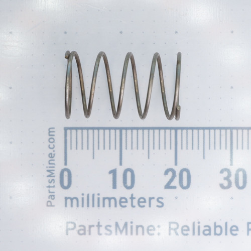 Century Spring CC-86CS compression spring profile next to a millimeter scale.