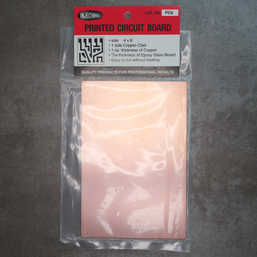 Injectorall PC6 single-sided copper clad circuit board in original hanging bag packaging.