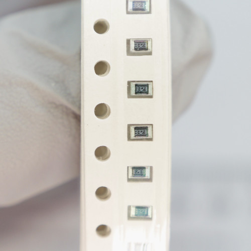 Panasonic ERJ-6ENF3323 surface mount resistors marked 3323 in tape.