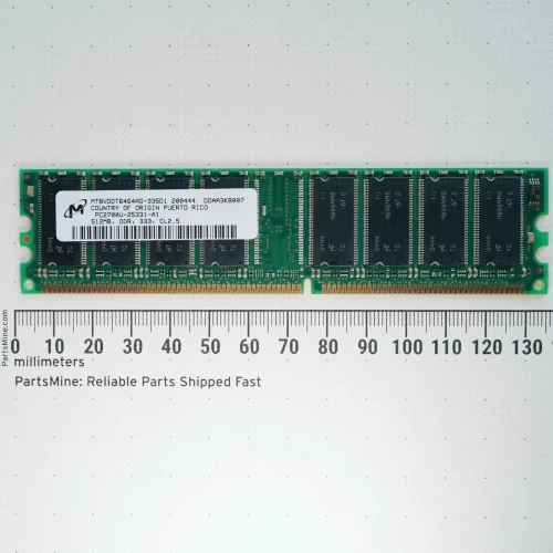 Micron Technology MT8VDDT6464AG-335D1 512MB DDR RAM module shown alongside a millimeter ruler.