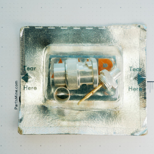 Sealed original blister package containing AMP Z-329064-1 connector components.