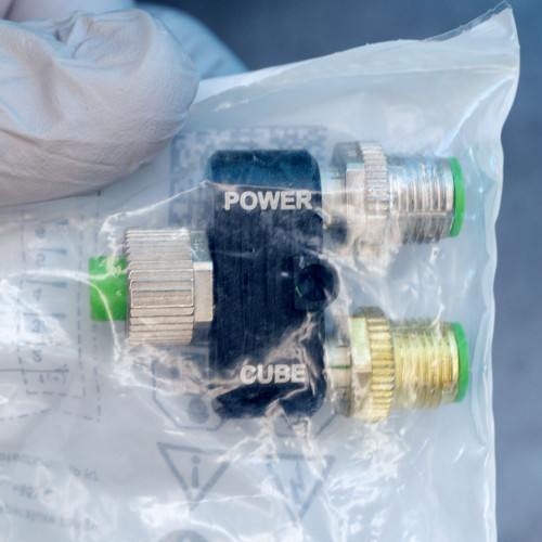 Murr Elektronik 7000-46101-0000000 M12 T-coupler close-up inside bag.