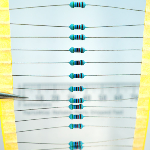Axial-lead 56k ohm metal film resistors taped in strip.