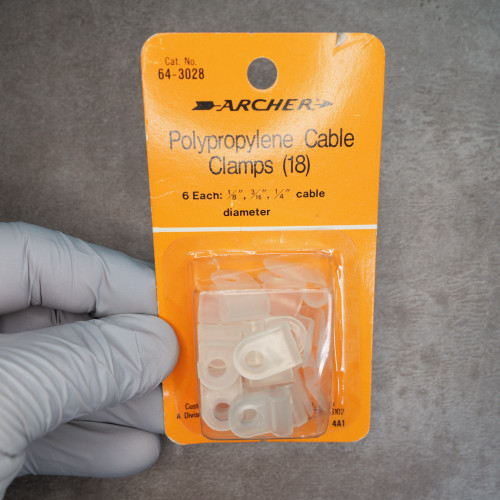 Archer 64-3028 polypropylene cable clamps in original blister packaging.