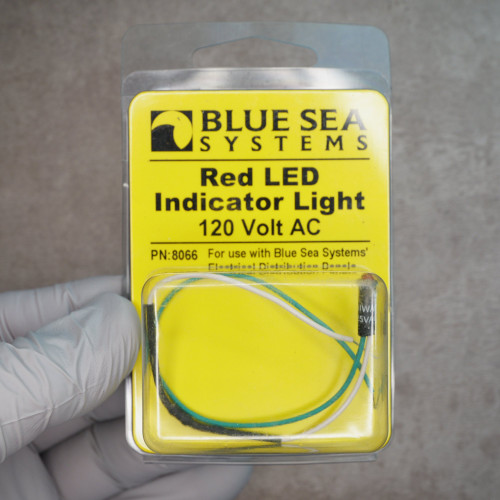 Blue Sea Systems 8066 red LED indicator light in original blister packaging.
