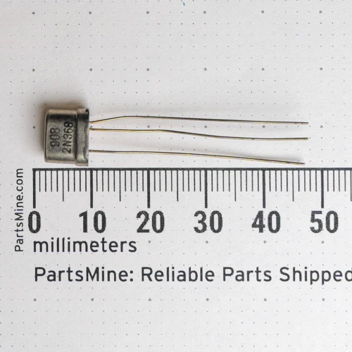 Texas Instruments 2N368 transistor with part markings beside a millimeter ruler.