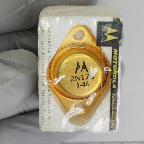 Motorola 2N176 transistor in original sealed foam packaging, top view.