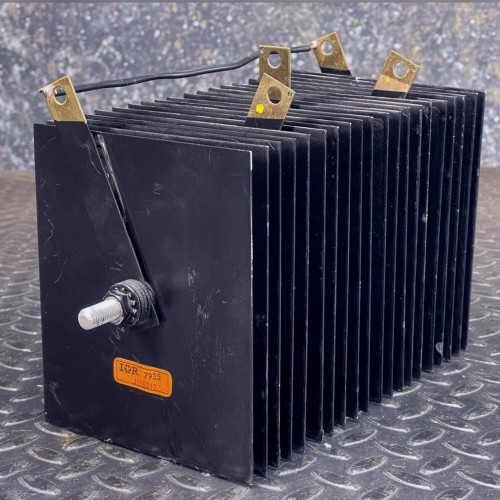 IOR J116B17 rectifier stack showing cooling plates, terminal lugs, and central mounting rod.