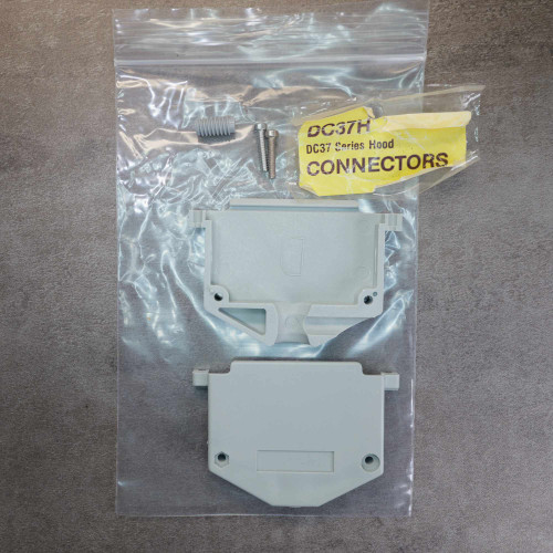 Unbranded DC37H D-sub hood kit in plastic bag with screws and grommet.