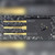 Motorola MJE1100 transistor marked face with logo and part number, leads extending left