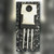 Back of the TO-220 transistor showing bare metal tab, mounting hole and three leads