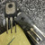 Three plastic power transistors, top one marked ASI MJE1093, another showing its metal heatsink pad