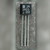Harris 2N3903 TO-92 transistor face-on, square H logo, 2N 3903 J 052 marking, three leads