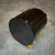 Rear end view of gloss black Helipot Model A phenolic case with gold terminal lugs
