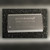 Single Winbond W9825G6JH-75 SDRAM chip in a 54-pin TSOP II package on dark surface