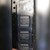 Row of Maxim MAX3225ECA marked 20-pin SSOP chips held between two fingers