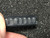 Seven ON Semiconductor MRA4003T3G surface mount rectifiers marked R13 in black carrier tape