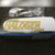 Hikari Halogen Lamps logo on the box face, bagged capsule visible behind it