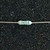 Close-up of Vishay Dale RN55E2551FJ resistor body showing RN55 E and 2551 markings.