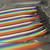 Opposite end showing black male pin connectors on PartsMine M/M200mmJW jumper wire ribbon.