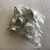 A clear plastic bag contains multiple silvercolored RCA 40325 vintage power transistors. The transistor most visible in the foreground clearly displays the RCA logo, the model number 40325, CFO, and 8L markings etched on its metallic, domeshaped TO3 style package, which includes a prominent mounting flange. These new old stock (NOS) electronic components appear unused and are suitable for vintage amplifier repair, audio equipment restoration, or as collector's items.
