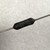 Close view of black tapered resistor body printed TEPRO and TS 1W, silver leads