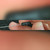 Black tapered resistor body printed TEPRO and TS 1W, held between finger and thumb