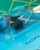 Angled side view of clear factory pouch holding both fiber optic devices on the card