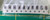 Full strip of ten taped ceramic capacitors sealed in a bag on green mat