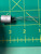 Aladdin 02-312 pulse transformer side view on cutting mat showing six wire leads