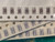 Three overlapping runs of taped chip capacitors, one horizontal and two crossing diagonals