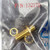 Gold-finished brass body with full external threading, hex nut, and internal star washer visible. Part number 132170 printed on bag above.