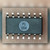 SOIC-14 body marked with TI logo, 9B EK9 RK and TL064C on a light crinkled surface